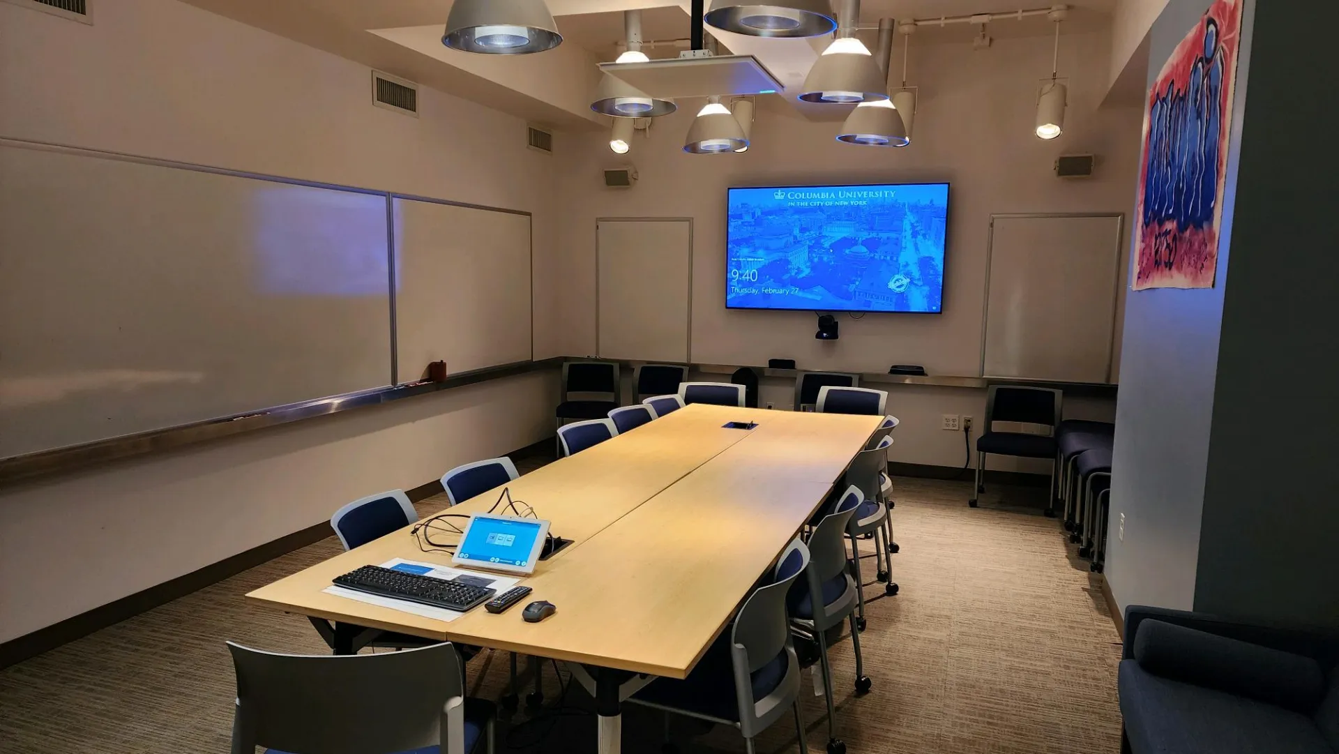 large conference room with audio visual connectivity, computer hookup, and seating for 20+